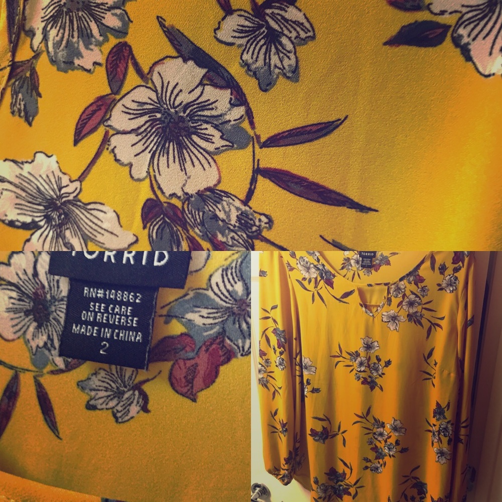 Yellow blouse with floral design